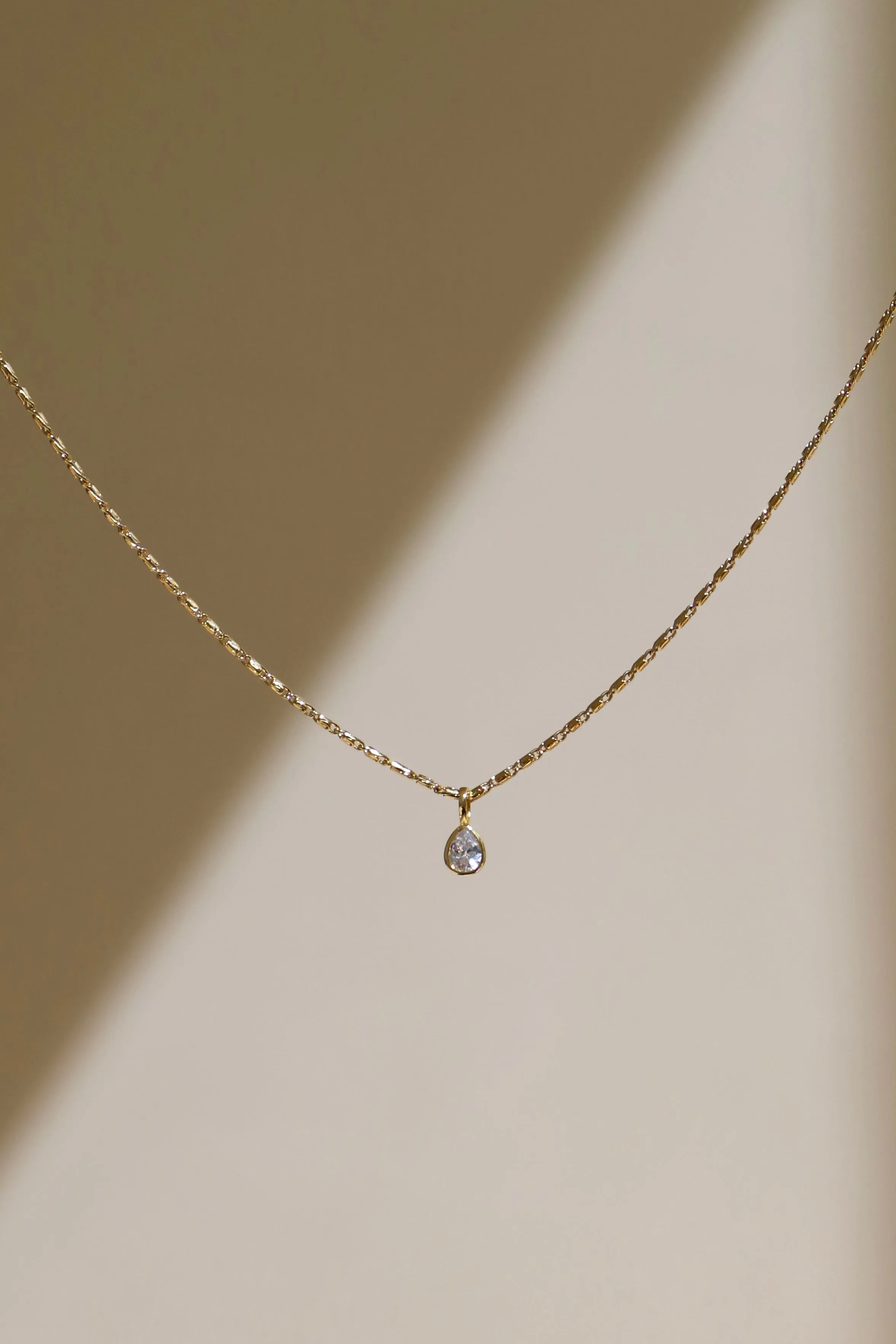 APRIL TEARDROP BEZEL NECKLACE