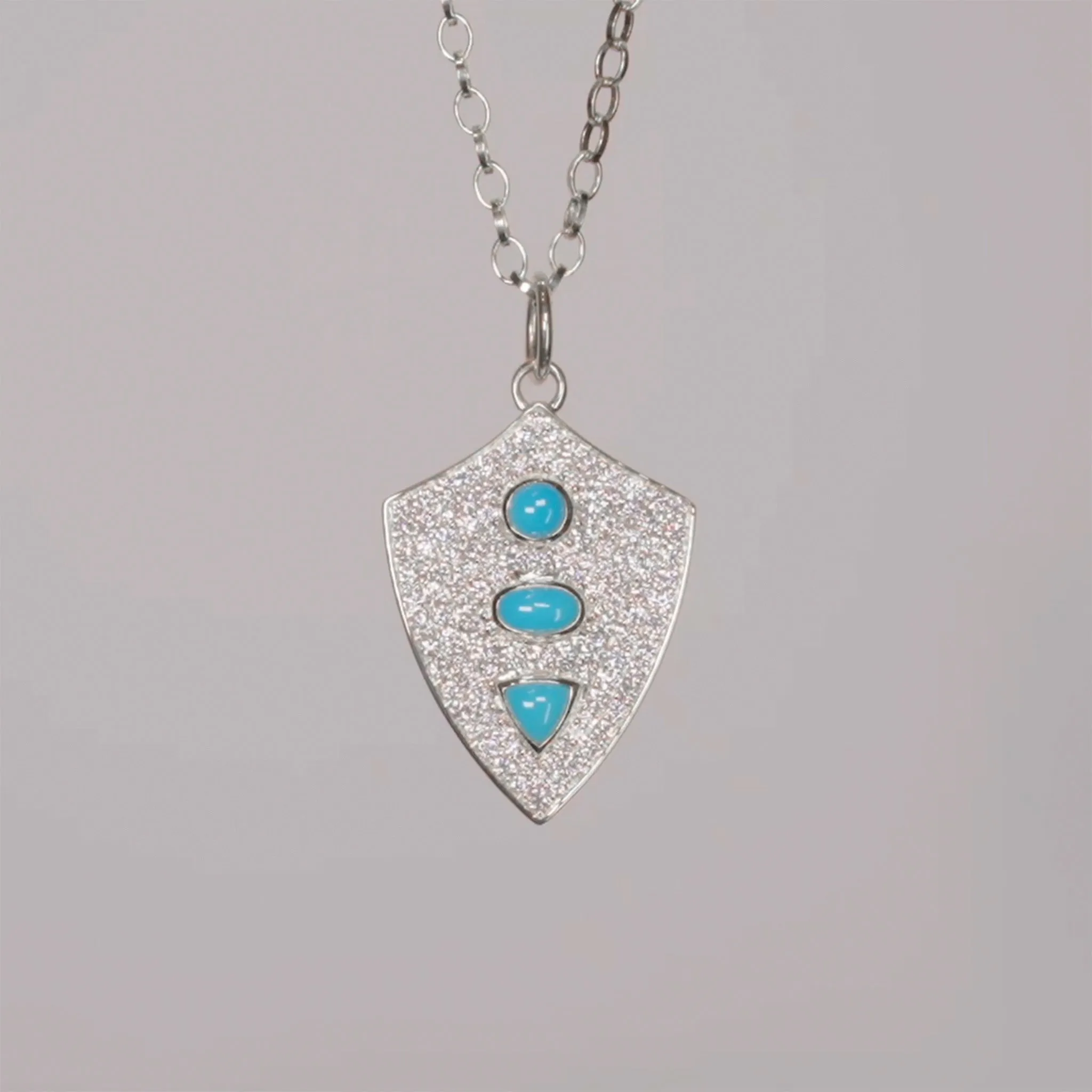 Fearless Shield with Turquoise and Pave White Sapphires