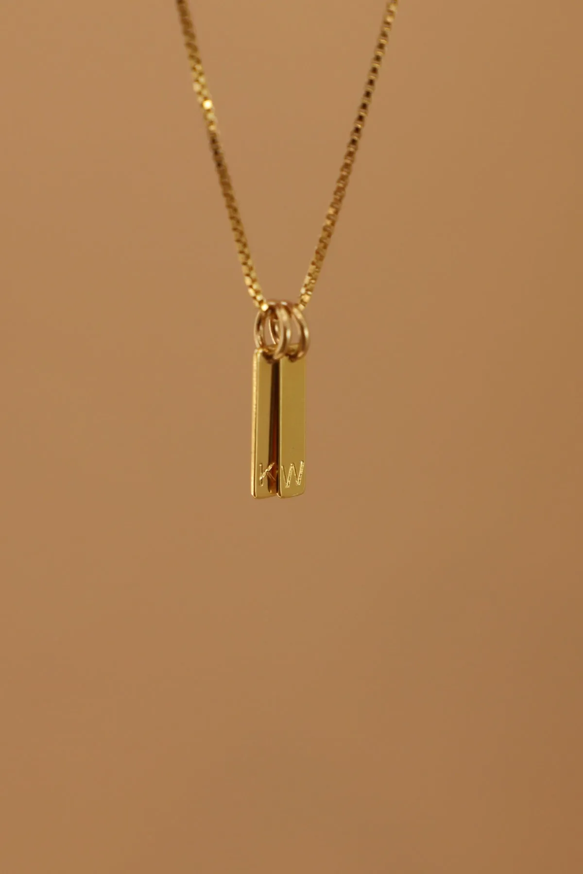 STAMPED INITIAL TAG CHARM